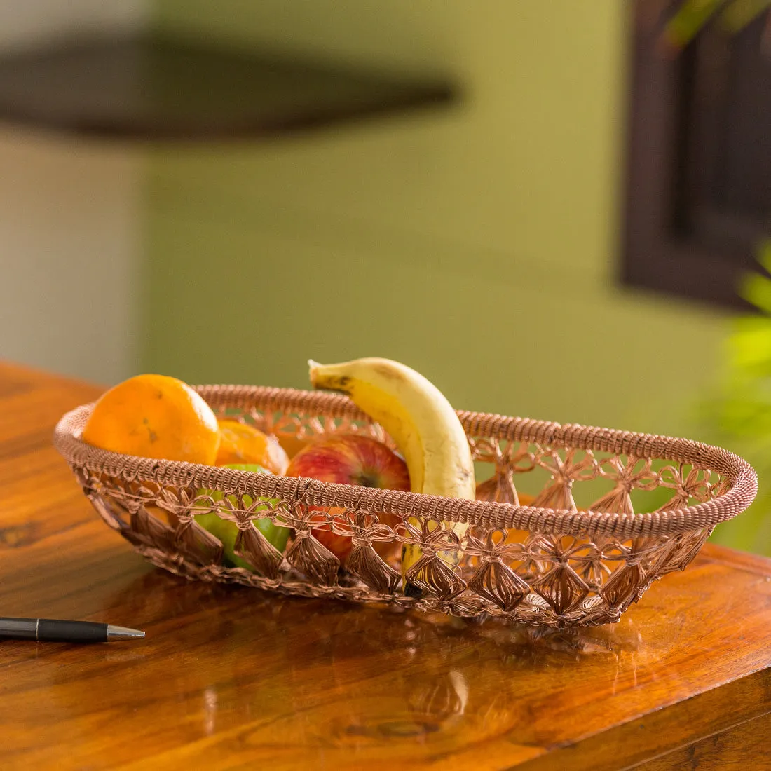 'The Knotted Mesh' Handwoven Fruit Basket In Iron (Copper Finish)